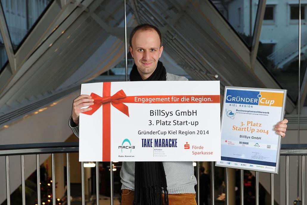 Dennis Dujan, der Gründer der BillSys GmbH, freute sich über seine Auszeichnung im Jahr 2014. Sein Unternehmen vertreibt innovative, webbasierte Kassensysteme